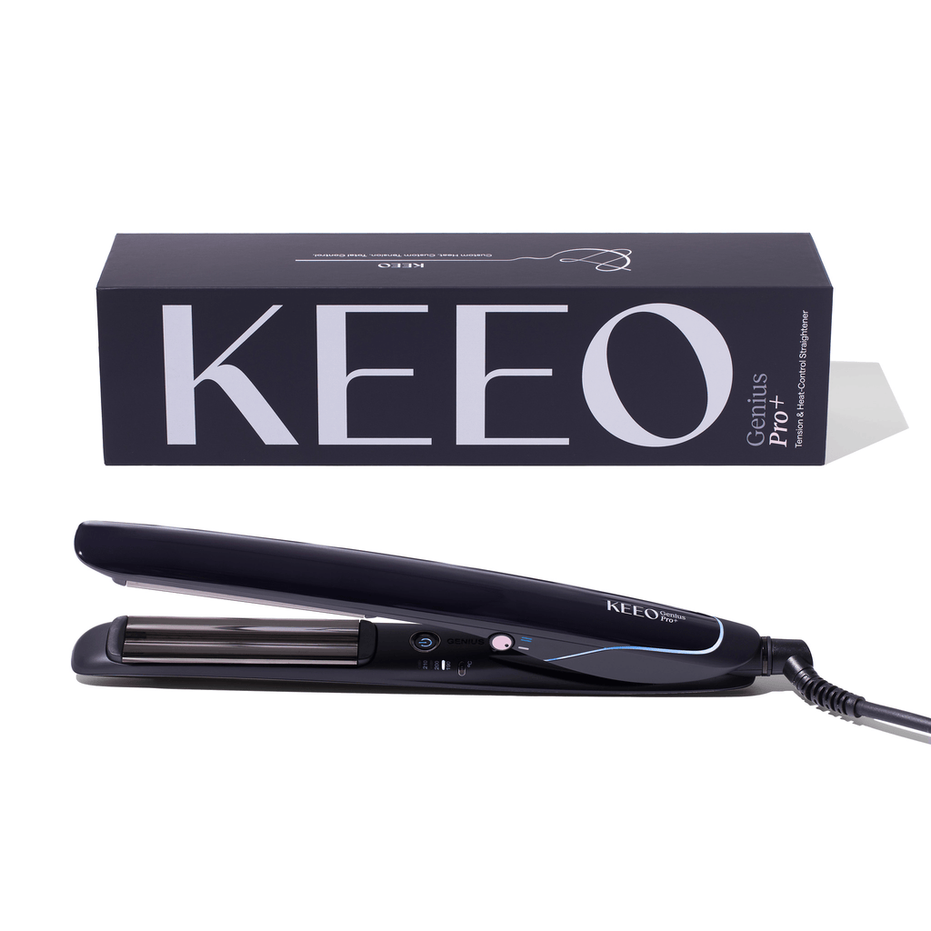 Black hair straightener with 'KEEO' branding next to its packaging on a white background